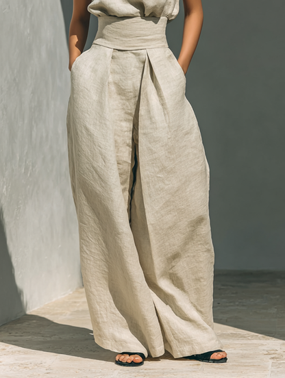 Set bestehend aus einer ärmellosen Bluse und einer Hose mit weitem Bein aus einem Baumwoll-Leinen-Mix.